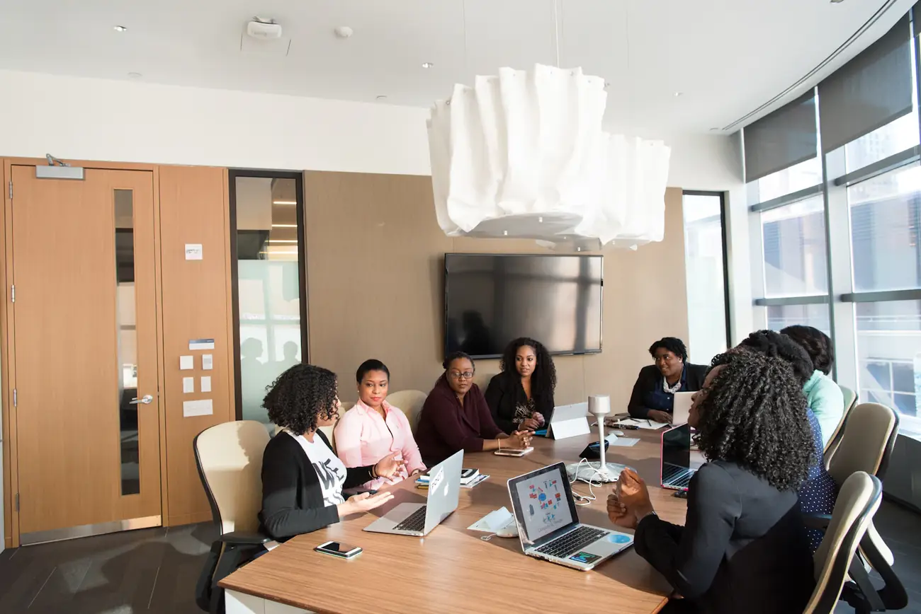 The Montra team in a planning session in the Lagos office